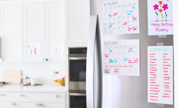 Two-week meal plan calendar on a wall board