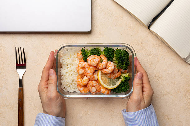 Office desk lunch with balanced protein and vegetables